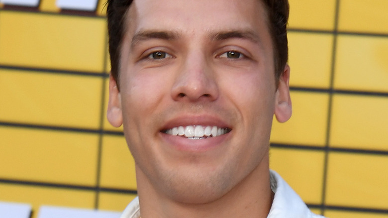 Joesph Baena posing at a premiere