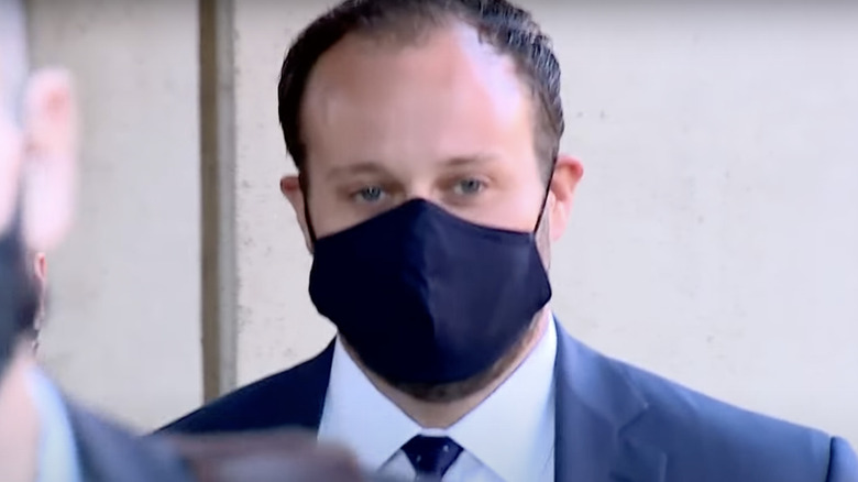 Josh Duggar walking into court