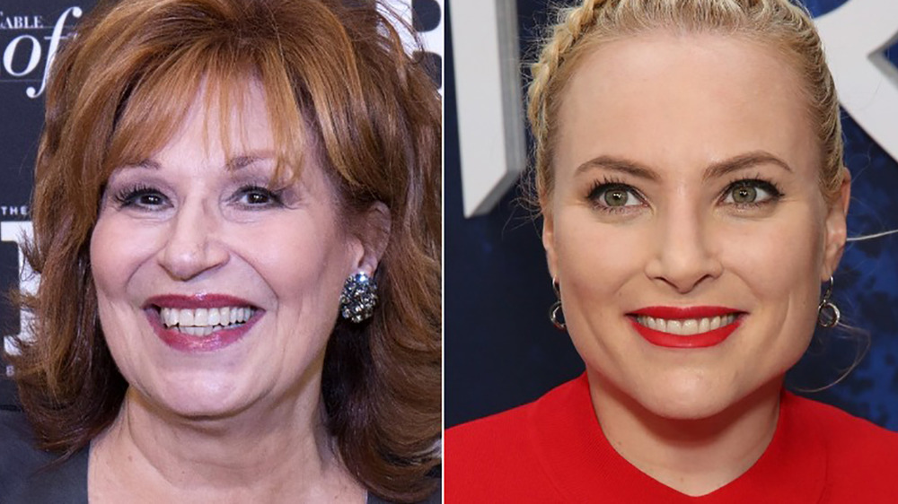 Joy Behar and Meghan McCain smiling side-by-side