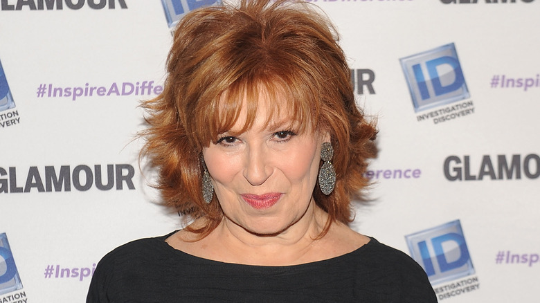 Joy Behar smirking