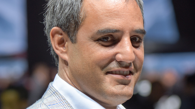 Juan Pablo Montoya smiles at an event