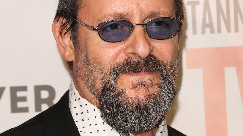 Judd Nelson staring with glasses