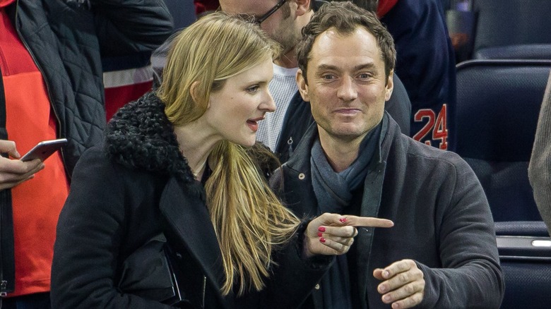 Phillipa Coan and Jude Law at the New York Rangers game