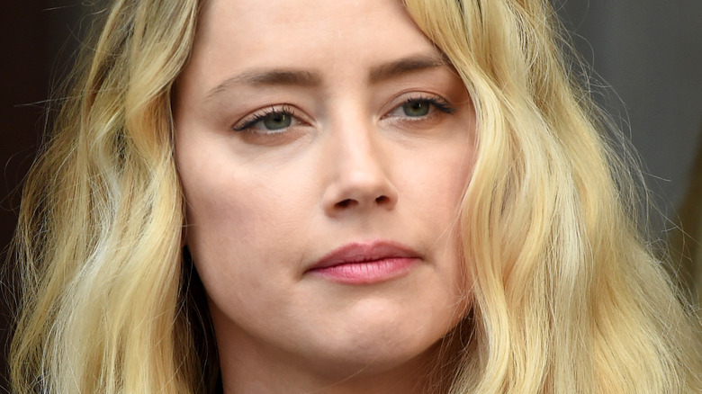 Amber Heard reacting outside the Royal Courts of Justice