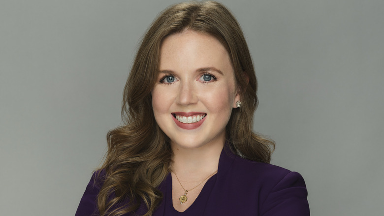 Sarah Rose smiling in promo shot for 'Judy Justice'