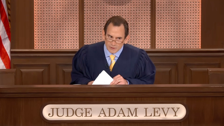 Adam Levy speaks from the bench of his TV show