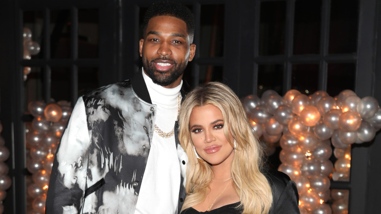 Tristan Thompson and Khloe Kardashian pose for a photo