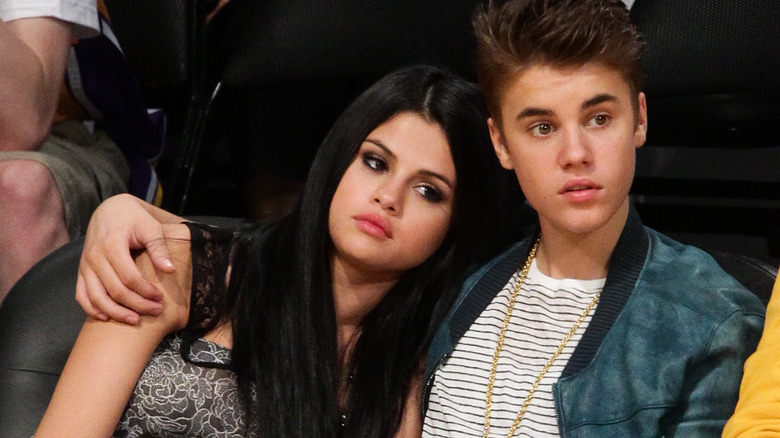 Selena Gomez and Justin Bieber at a basketball game in 2012