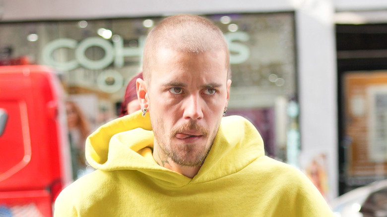 Justin Bieber in a yellow hoodie in New York City