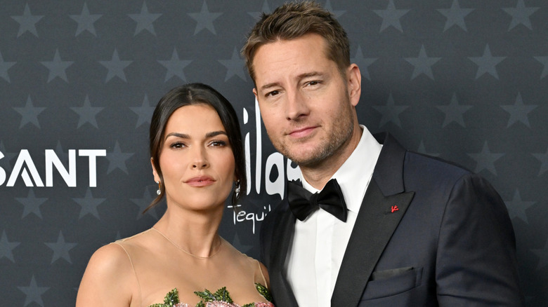 Justin Hartley and Sofia Pernas pose in 2026.