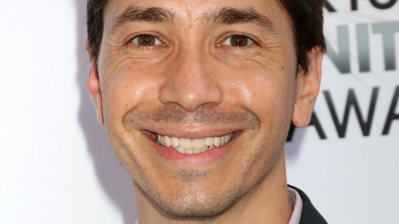 Justin Long smiling