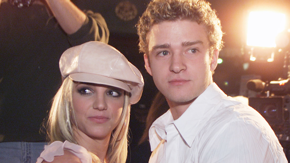 Britney Spears and Justin Timberlake looking off camera