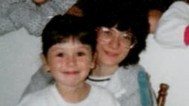 Jenni Farley's mother holding her and smiling