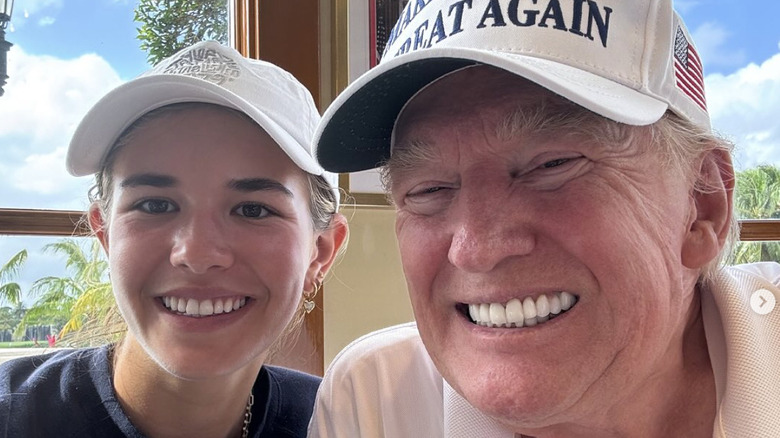 Kai Trump and Donald Trump smiling in a photo