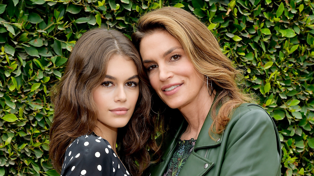 Kaia Gerber and mom Cindy Crawford posing 