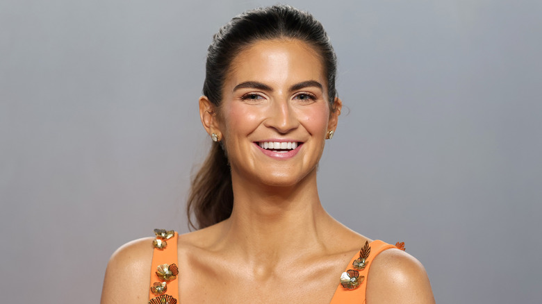 Kaitlan Collins smiling brightly at 2026 Vanity Fair Oscar Party