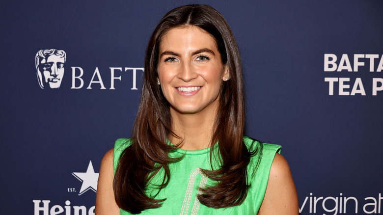 Kaitlan Collins wearing a green dress