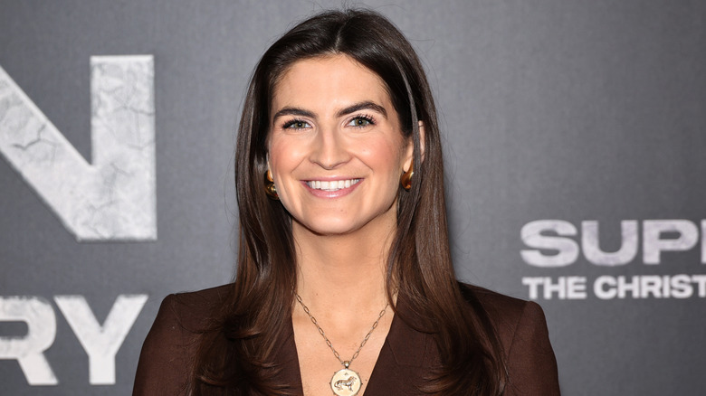 Kaitlan Collins smiling at event