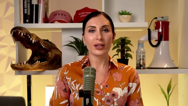 Laura Loomer speaking into microphone