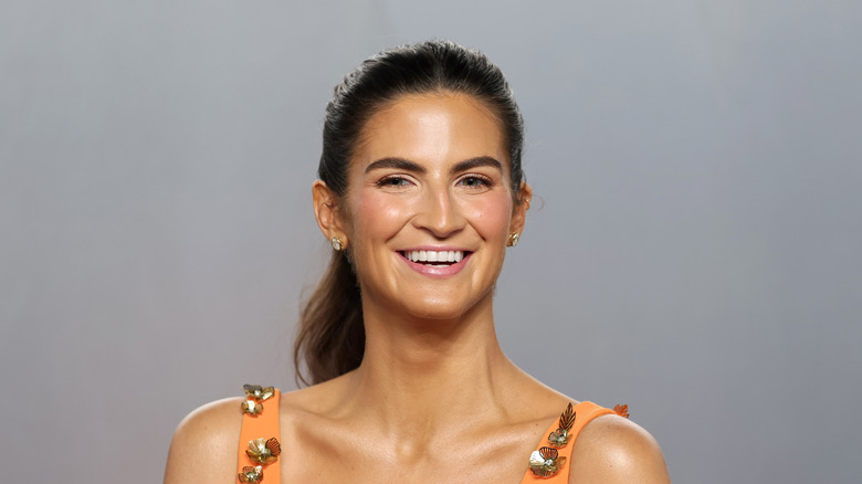 Kaitlan Collins smiling with teeth