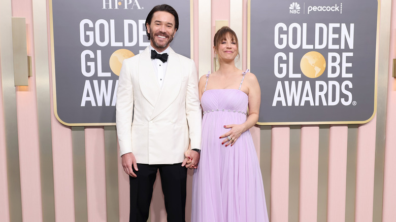 Kaley Cuoco and Tom Pelphrey posing for the cameras