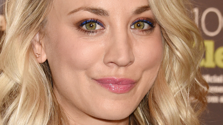 Kaley Cuoco smiling on a red carpet