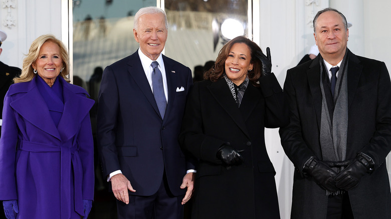 Jill and Joe Biden smiling next to Kamala Harris and Doug Emhoff