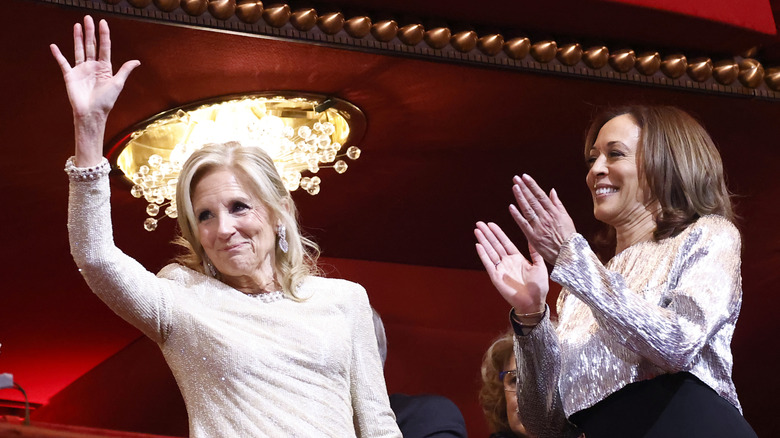 Jill Biden waving next to Kamala Harris