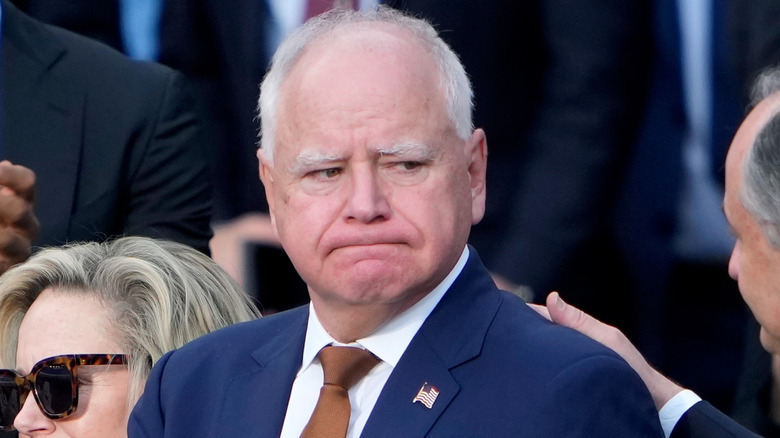 Tim Walz appears emotional after Kamala Harris concedes the election to Donald Trump.