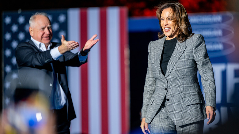 Tim Walz and Kamala Harris on stage.