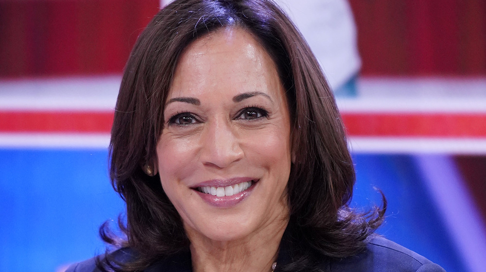 Kamala Harris smiling for cameras