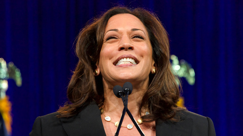Kamala Harris smiling with chin up