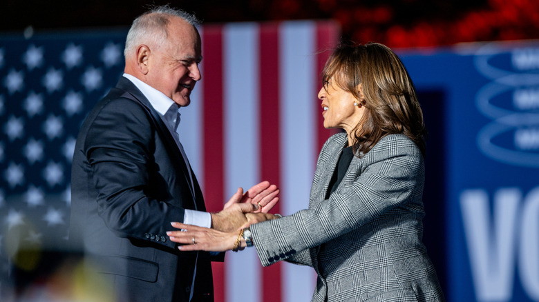 Tim Walz and Kamala shaking hands