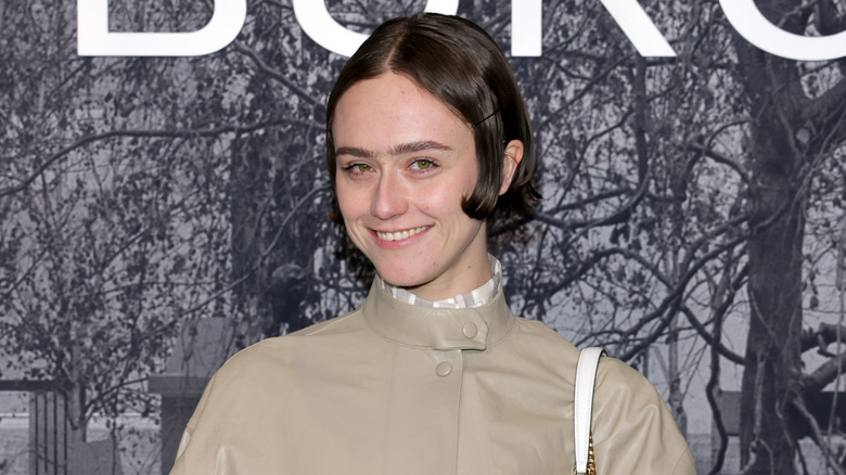 Ella Emhoff smiling wearing a winter coat