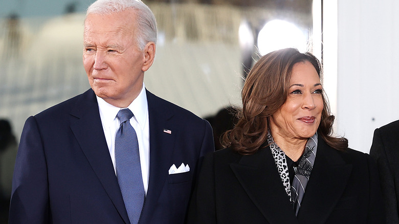 Joe Biden and Kamala Harris standing in a crowd