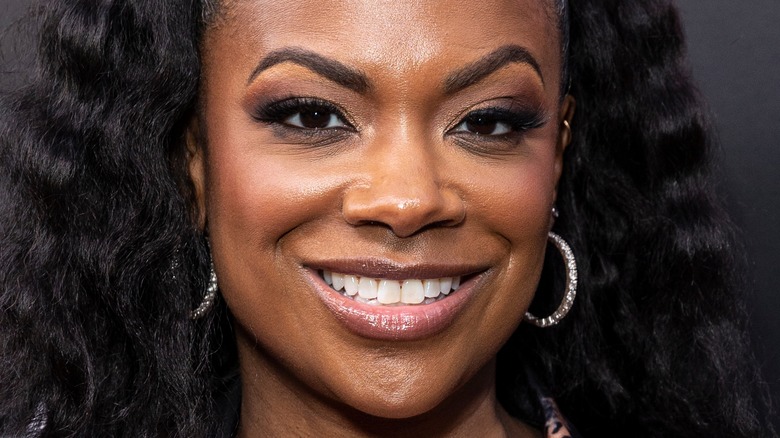 Kandi Burruss smiling