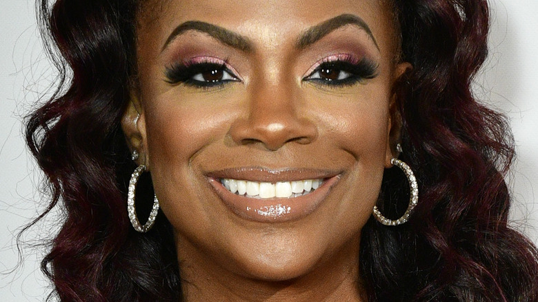 Kandi Burruss smiling red carpet