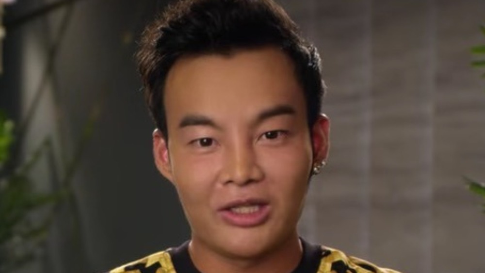 Kane Lim in a confessional 