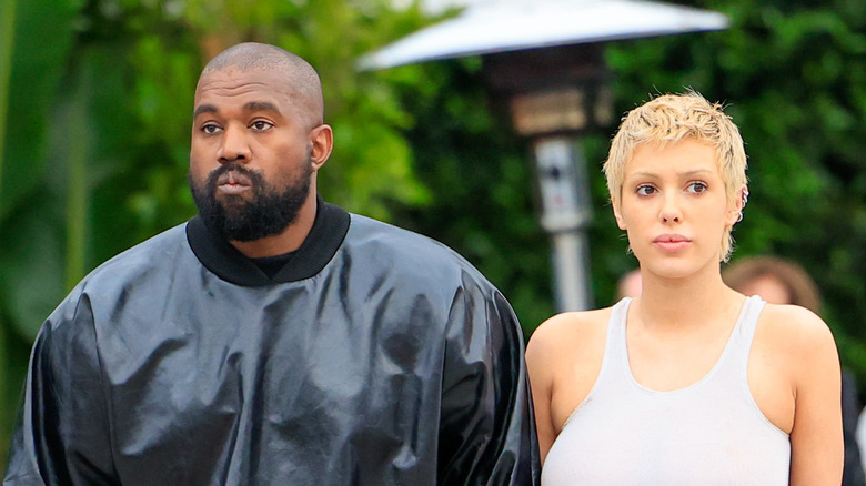Kanye West and Bianca Censori walking
