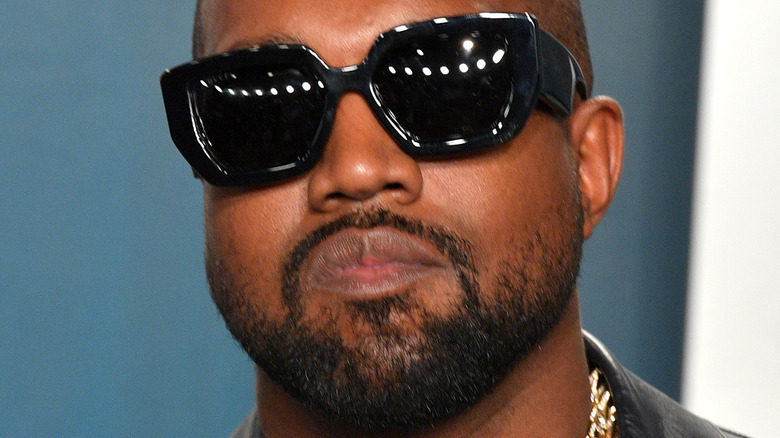Kanye West not smiling