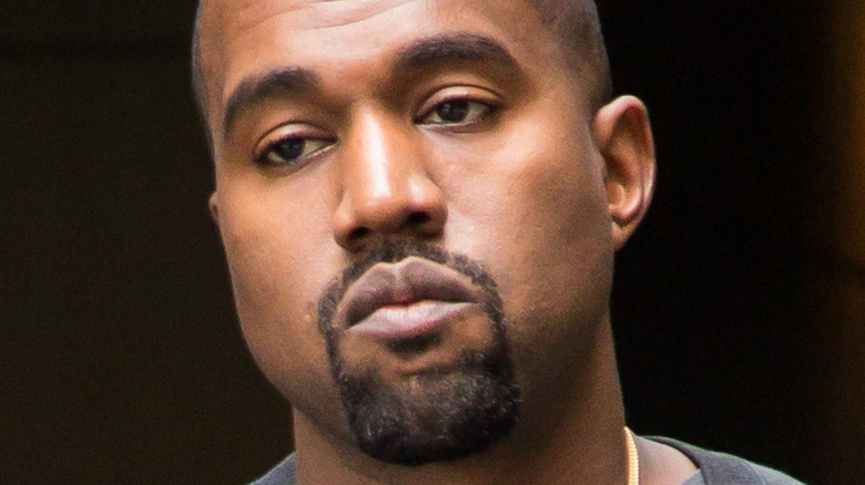 Kanye West not smiling