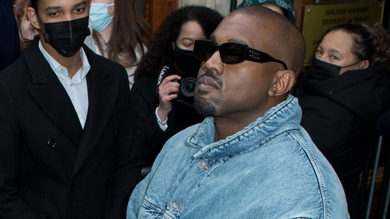 Kanye "Ye" West entering a building