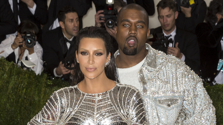 Kim Kardashian posing with Kanye West