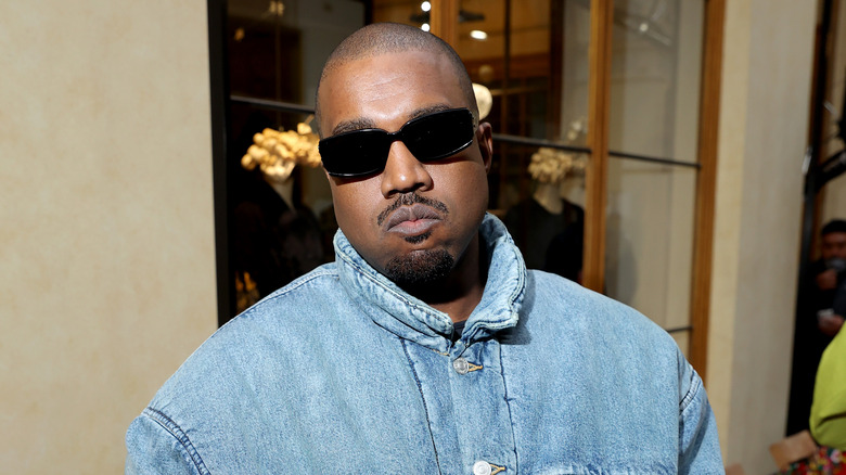 Ye attending the Kenzo Fall/Winter 2022/2023 show