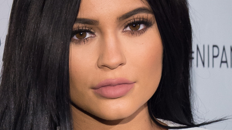 unsmiling Kylie Jenner