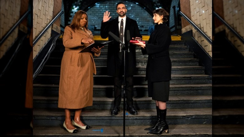 Rama Duwaji wearing an all-black outfit and standing beside husband Zohran Mamdani during his swearing-in ceremony