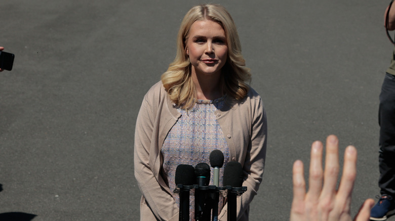Karoline Leavitt talking to the press outside of the West Wing