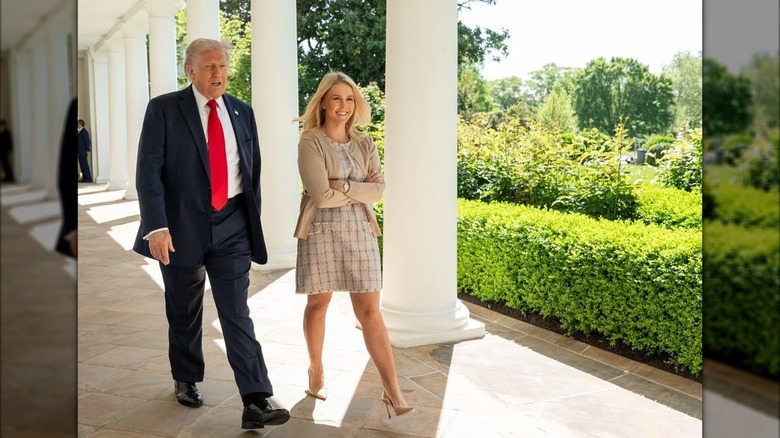 Karoline Leavitt walking beside Donald Trump