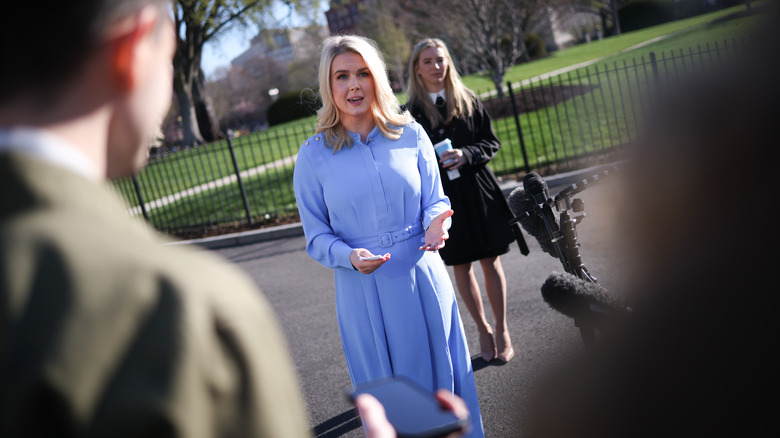 Karoline Leavitt in a blue dress