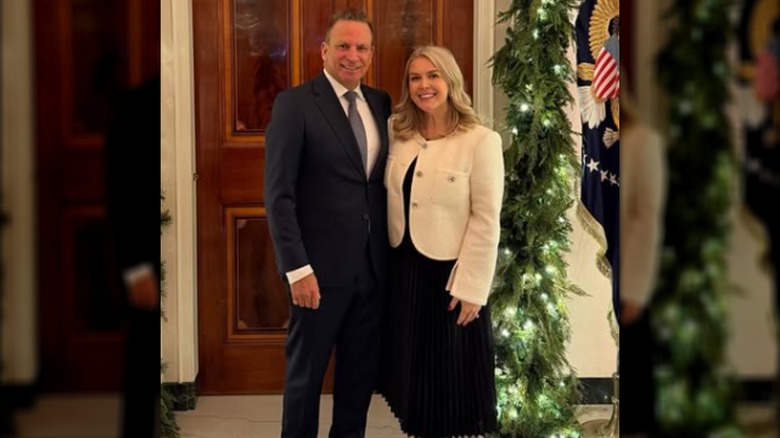 Karoline Leavitt and Nicholas Riccio pose together at the White House 2025 Christmas party.